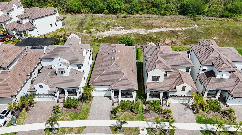 1071 Seagrape Drive Ruskin, FL 33570 - Photo 76 of 100 an aerial view of residential houses with outdoor space and swimming pool