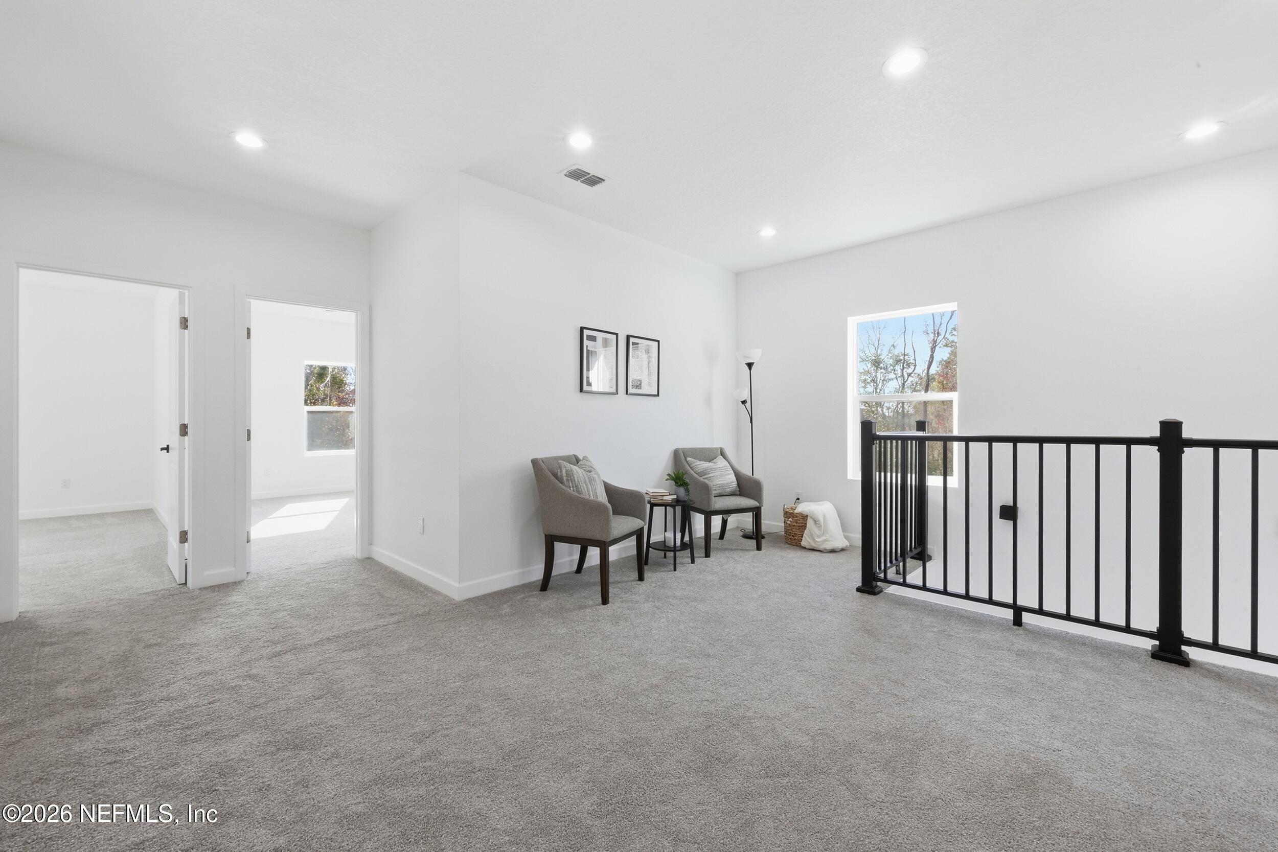 4199 Pine Road Orange Park, FL 32065 - Photo 27 of 44 a view of a livingroom with furniture and windows