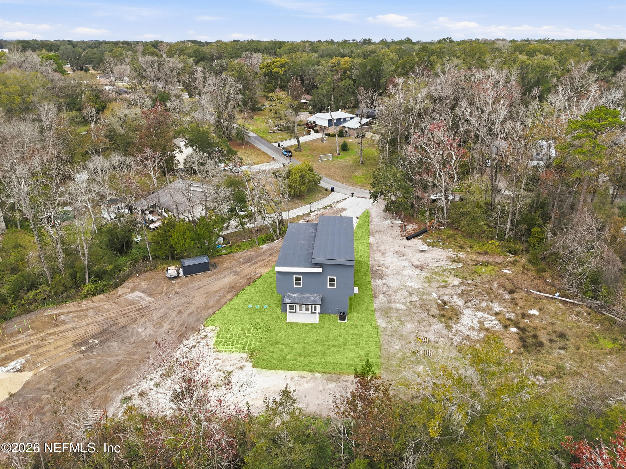 4199 Pine Road Orange Park, FL 32065 - Photo 44 of 44 an aerial view of residential houses with outdoor space and trees