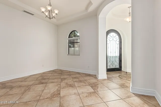 a kitchen with stainless steel appliances a stove a microwave and a refrigerator