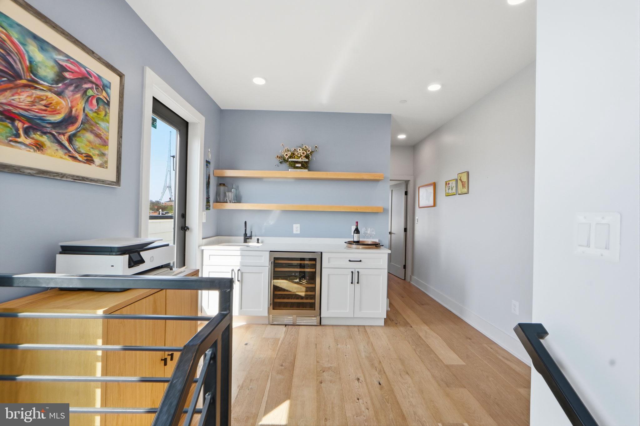 623 Kennedy Street Northwest, Unit 10 Washington, DC 20011 - Photo 19 of 34 a view of a kitchen with furniture and a fireplace