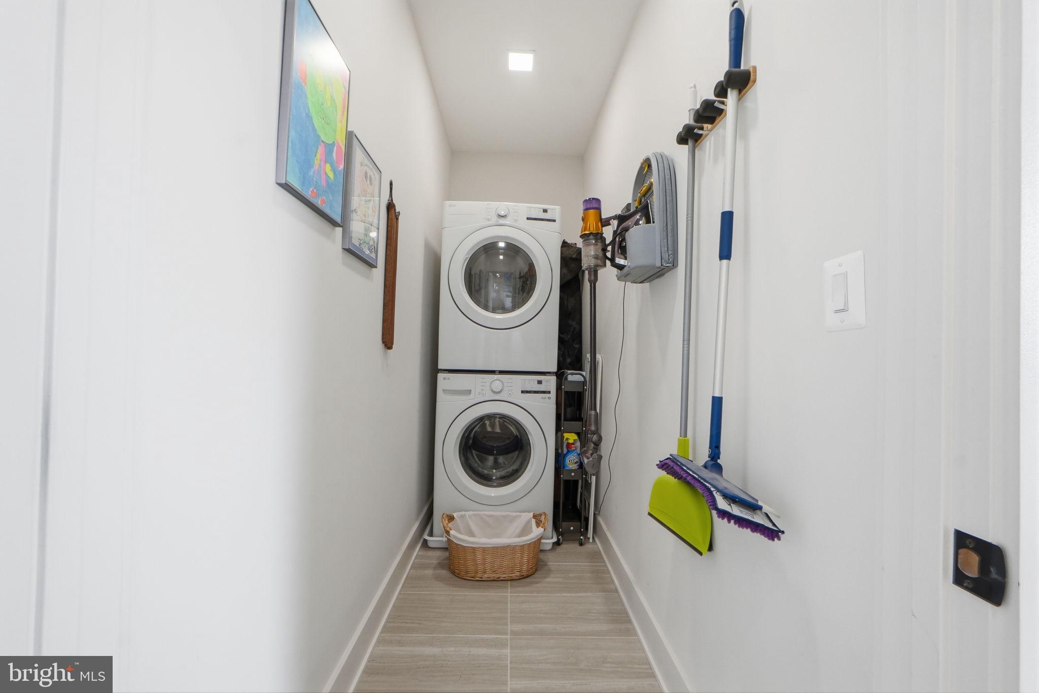 623 Kennedy Street Northwest, Unit 10 Washington, DC 20011 - Photo 22 of 34 a utility room with dryer and washer