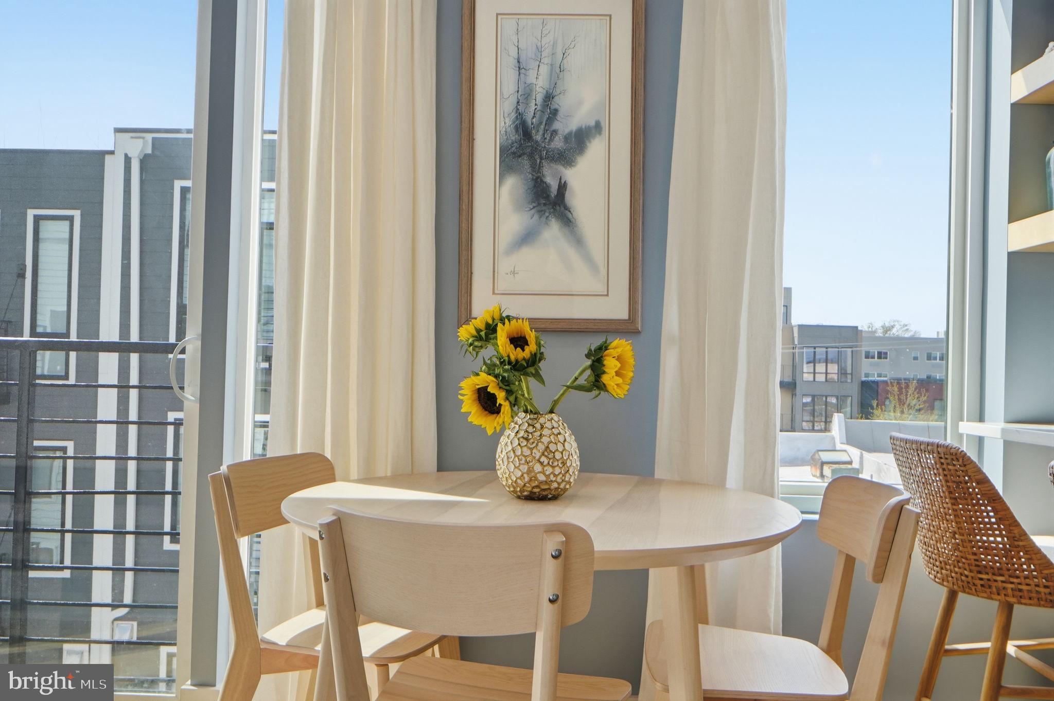623 Kennedy Street Northwest, Unit 10 Washington, DC 20011 - Photo 10 of 34 a dining room with furniture and window