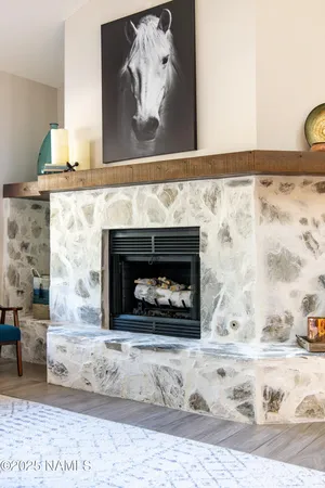a fireplace with a wooden floor