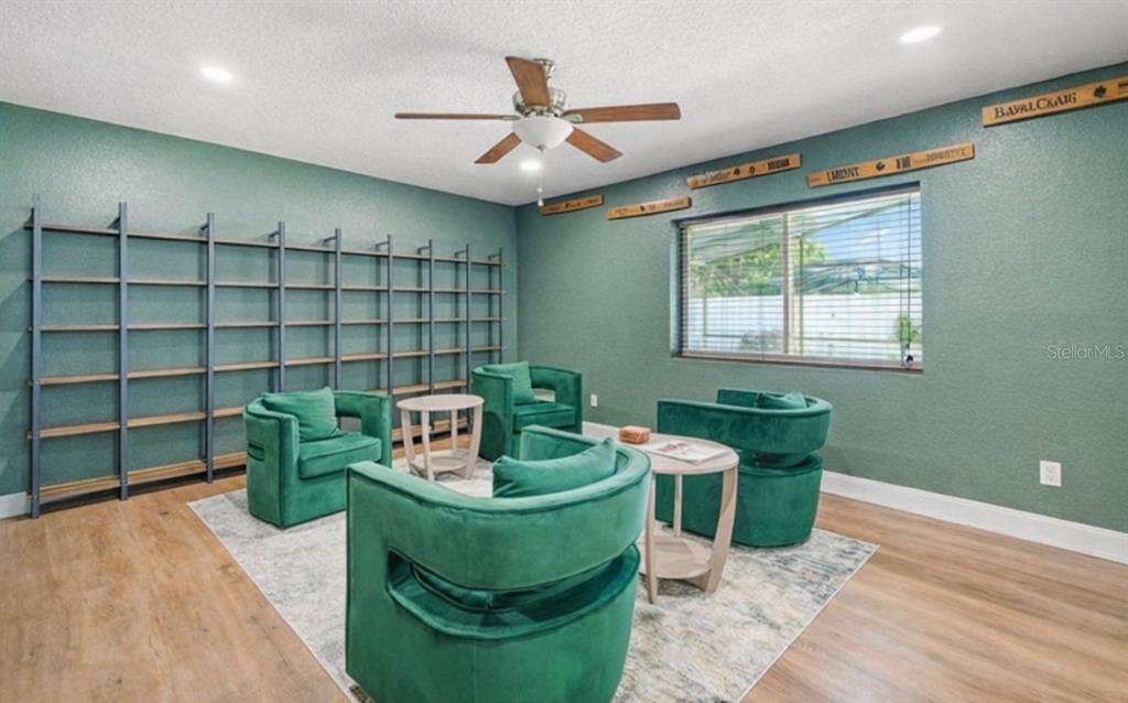 9653 Golden Grove Street Seminole, FL 33772 - Photo 9 of 29 a living room with furniture and a window