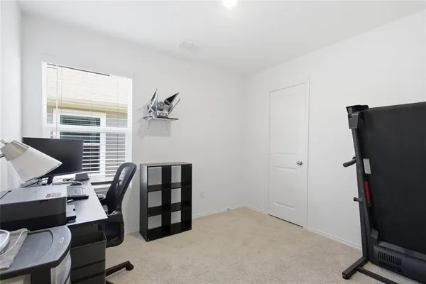 a view of livingroom with furniture and windows