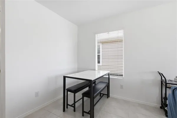 a room with a table and a chair