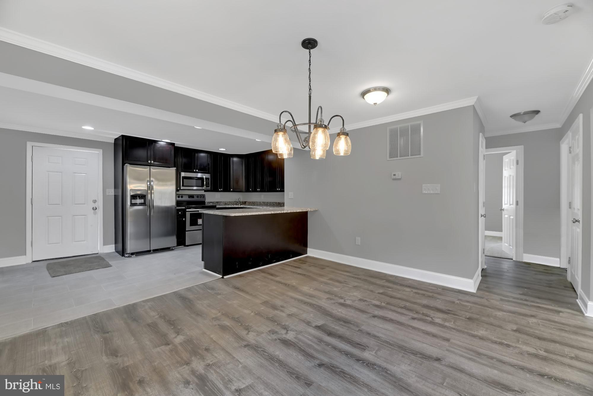 916 Milford Mill Road Baltimore, MD 21208 - Photo 8 of 27 Dining Room / Kitchen