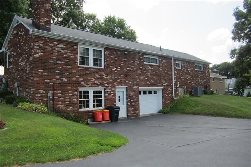 467 Old Hickory Ridge Road Washington, PA 15301 - Photo 2 of 25 Rear of home. Note black top driveway and large parking area.