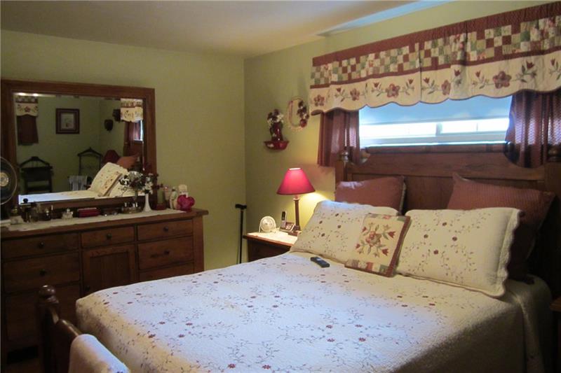 467 Old Hickory Ridge Road Washington, PA 15301 - Photo 11 of 25 Master bedroom. This room has two double closets and hardwood flooring.
