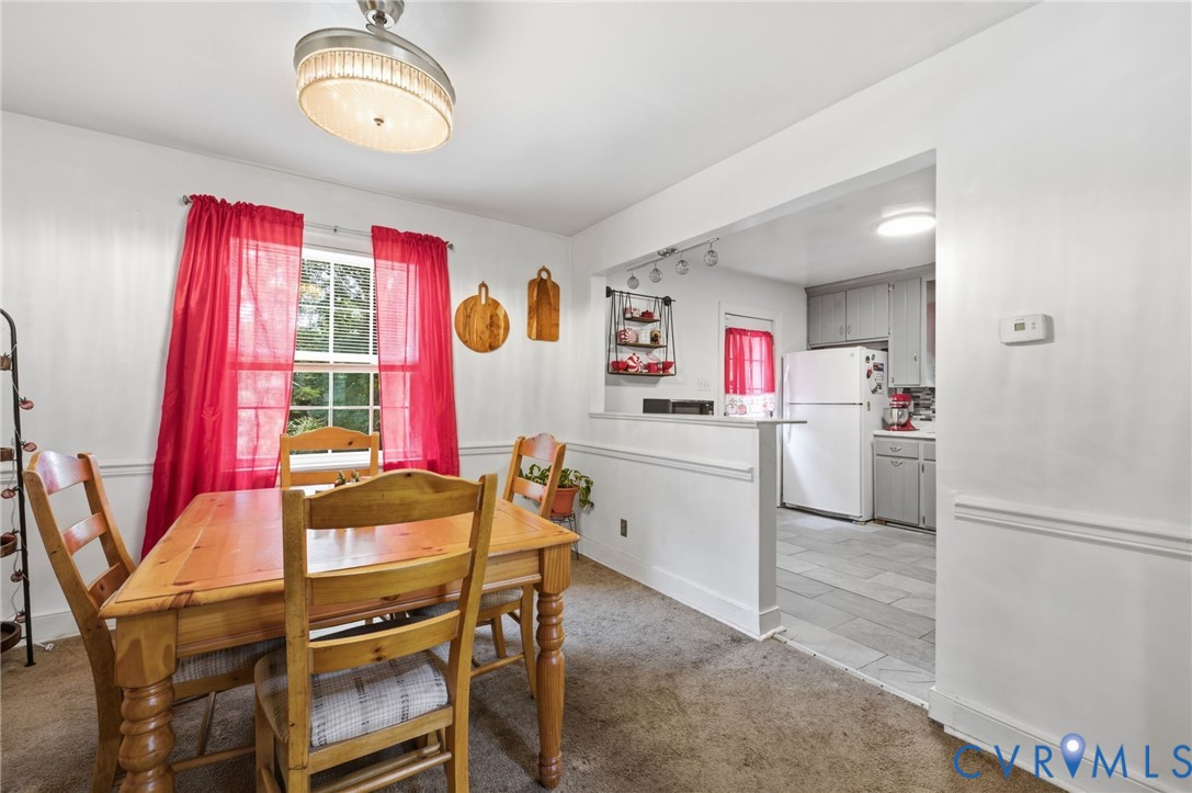 4021 Beulah Road Richmond, VA 23237 - Photo 9 of 27 Dining area featuring a window, overhead light fix