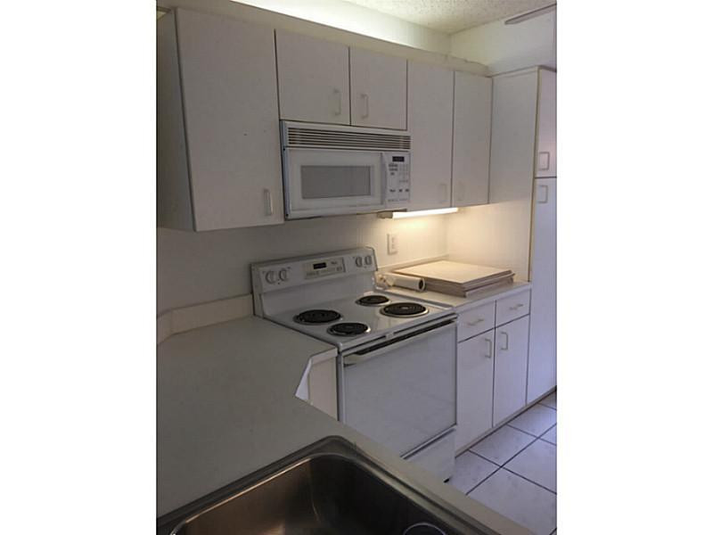 9599 Weldon Circle, Unit 304 Tamarac, FL 33321 - Photo 12 of 16 Kitchen