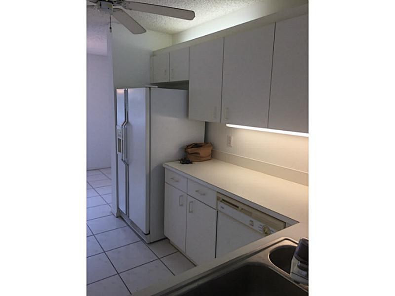 9599 Weldon Circle, Unit 304 Tamarac, FL 33321 - Photo 13 of 16 Kitchen