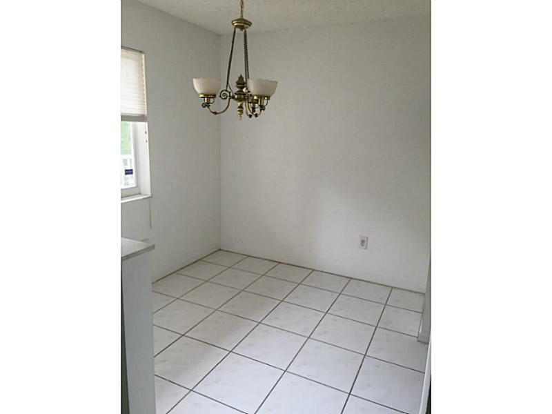 9599 Weldon Circle, Unit 304 Tamarac, FL 33321 - Photo 2 of 16 Kitchen