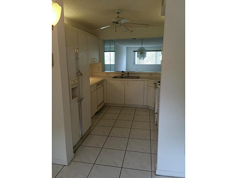 9599 Weldon Circle, Unit 304 Tamarac, FL 33321 - Photo 3 of 16 Kitchen