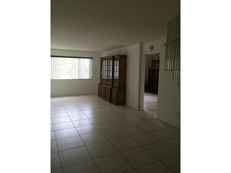 9599 Weldon Circle, Unit 304 Tamarac, FL 33321 - Photo 6 of 16 Living Room