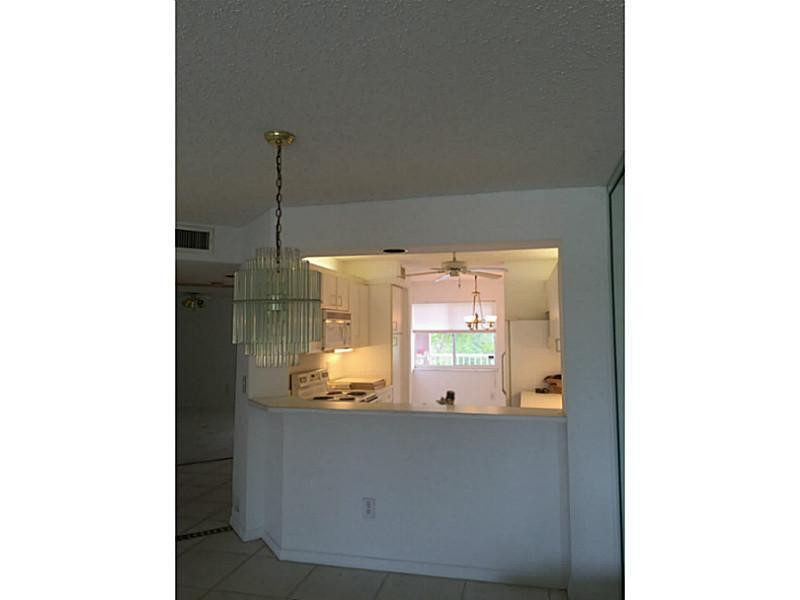 9599 Weldon Circle, Unit 304 Tamarac, FL 33321 - Photo 7 of 16 Kitchen