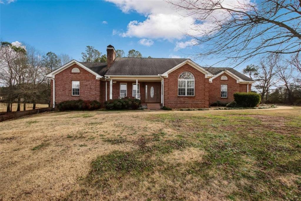 926 Carson Farm Road Carnesville, GA 30521 - Photo 1 of 1 a front view of a house with a yard covered in snow