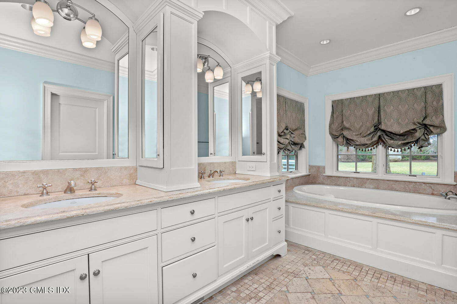 1300 Rock Rimmon Road Stamford, CT 06903 - Photo 16 of 34 a bathroom with 2 sink tub and a mirror