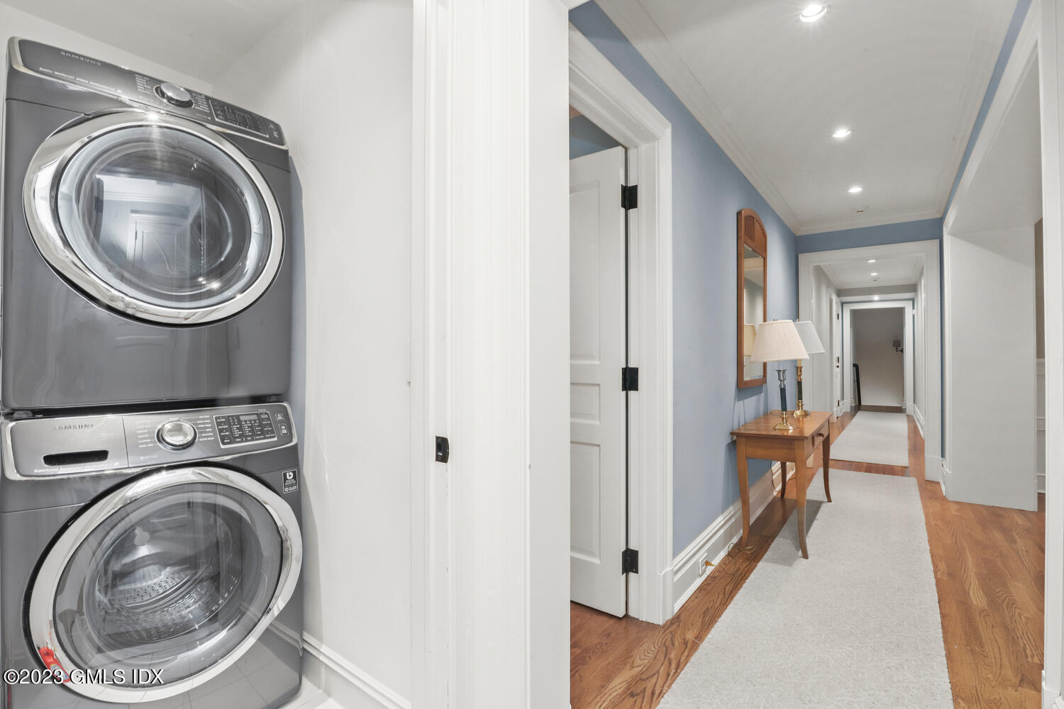 1300 Rock Rimmon Road Stamford, CT 06903 - Photo 18 of 34 a view of a hallway with washer and dryer