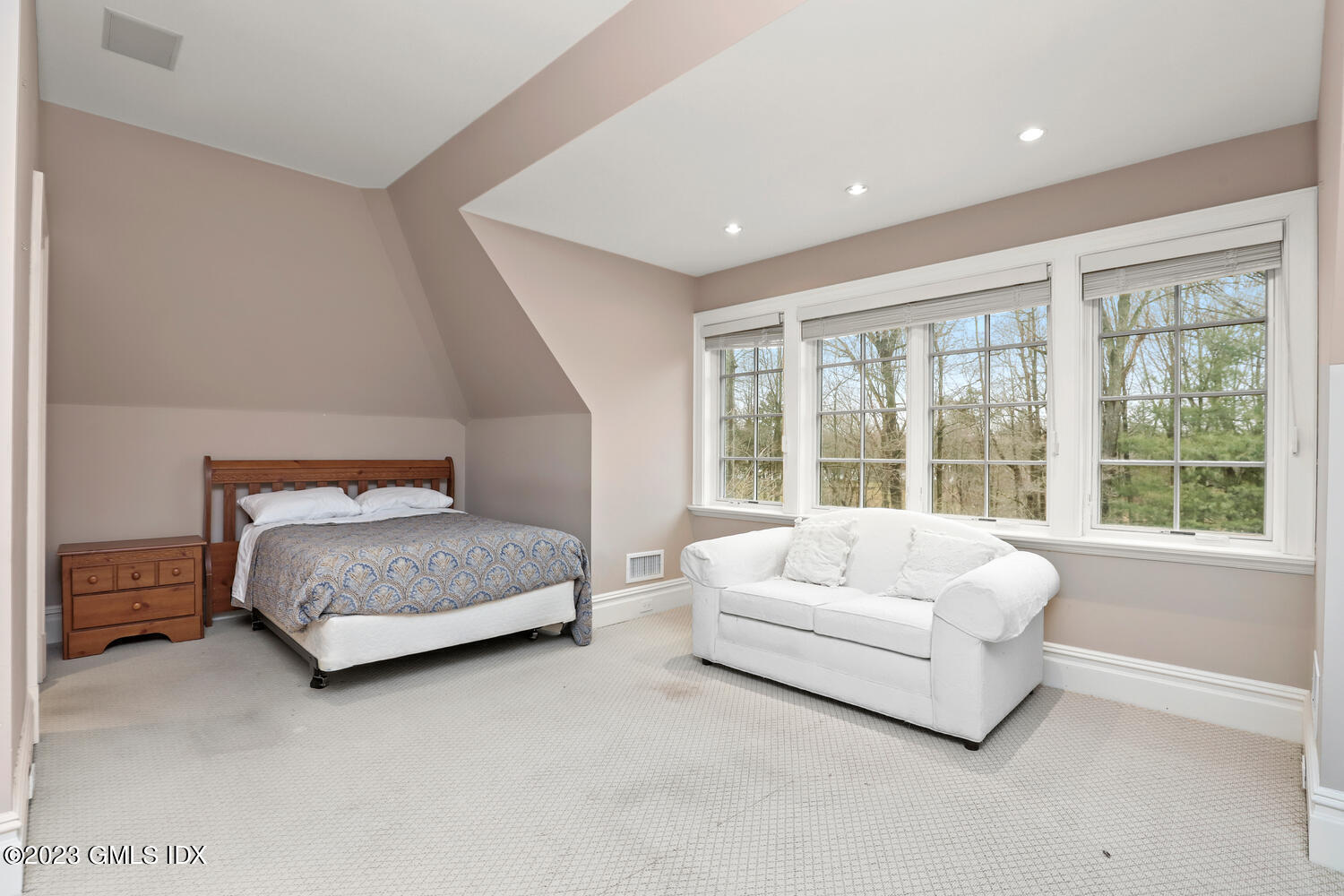 1300 Rock Rimmon Road Stamford, CT 06903 - Photo 25 of 34 a spacious bedroom with a bed and a large window