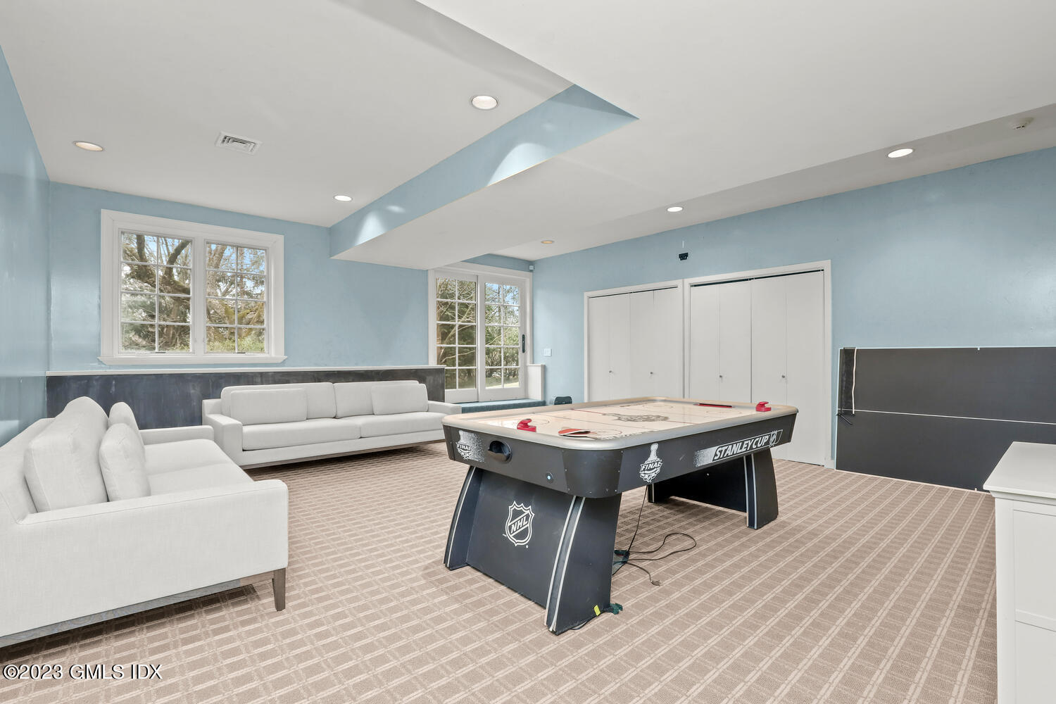 1300 Rock Rimmon Road Stamford, CT 06903 - Photo 27 of 34 a view of a livingroom with furniture and window