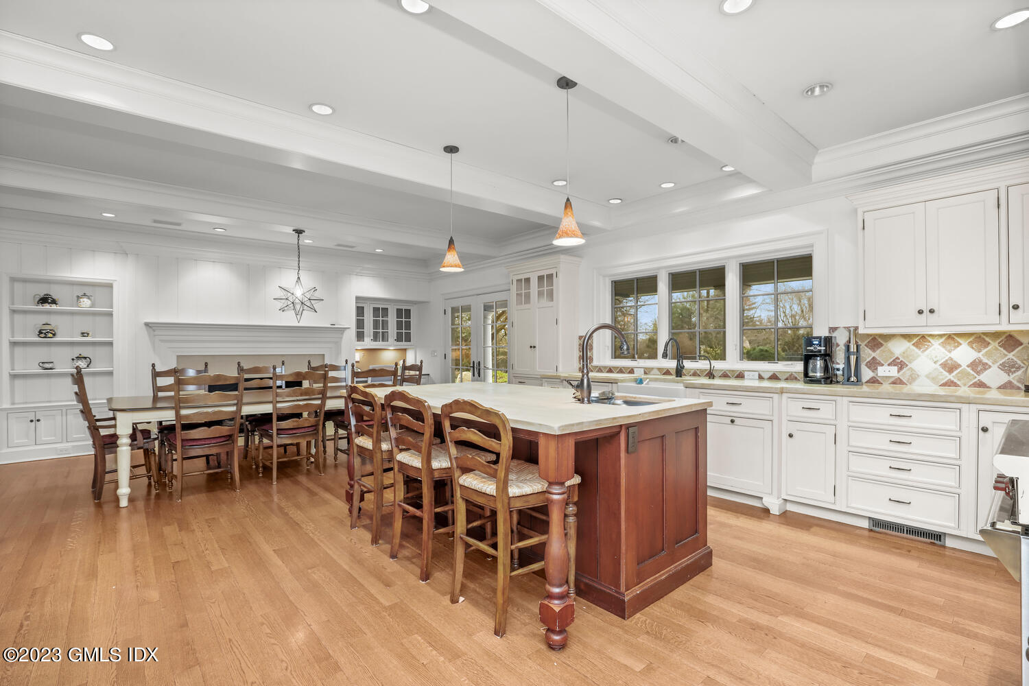 1300 Rock Rimmon Road Stamford, CT 06903 - Photo 7 of 34 a kitchen with lots of counter top space and dining table