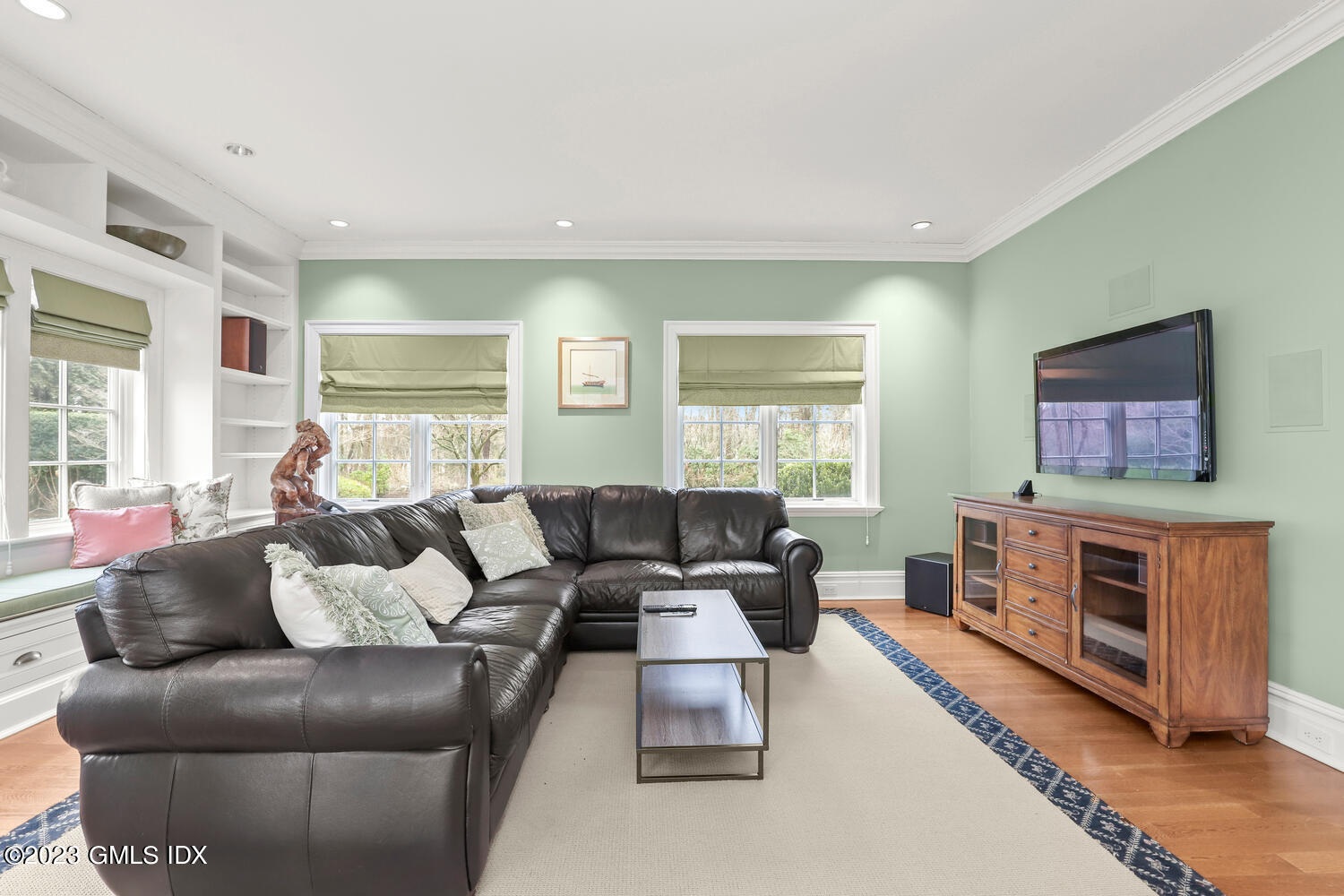 1300 Rock Rimmon Road Stamford, CT 06903 - Photo 10 of 34 a living room with furniture and a flat screen tv