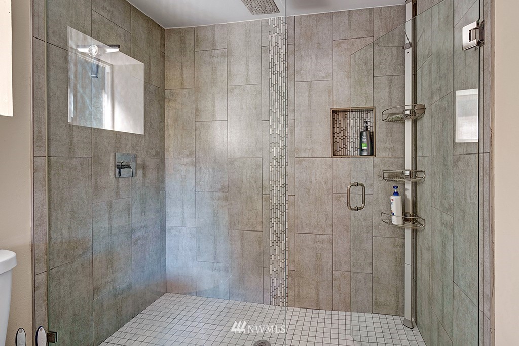 11225 Southeast 22nd Street Renton, WA 98055 - Photo 17 of 28 a bathroom with a shower and a sink