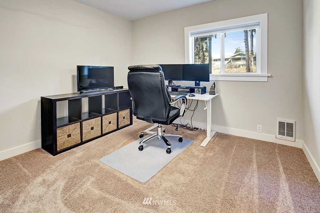 11225 Southeast 22nd Street Renton, WA 98055 - Photo 20 of 28 a view of workspace with wooden floor windows