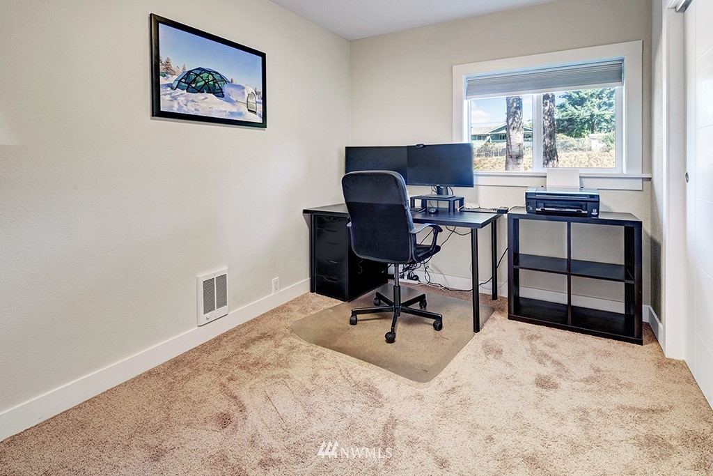 11225 Southeast 22nd Street Renton, WA 98055 - Photo 21 of 28 a view of a workspace with furniture and a window