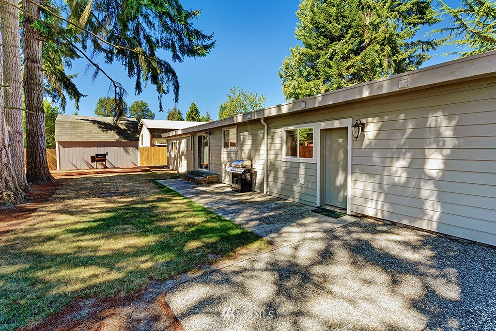 11225 Southeast 22nd Street Renton, WA 98055 - Photo 24 of 28 a view of a house with backyard and sitting area