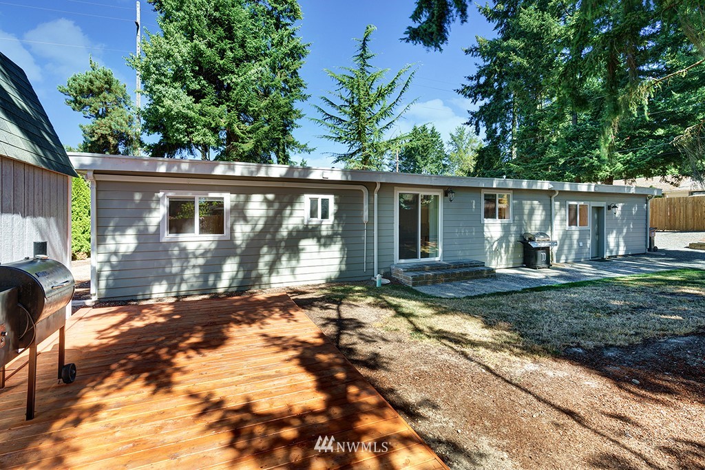 11225 Southeast 22nd Street Renton, WA 98055 - Photo 26 of 28 a view of a house with a yard