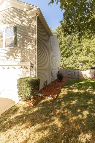 a view of a yard with an outdoor space