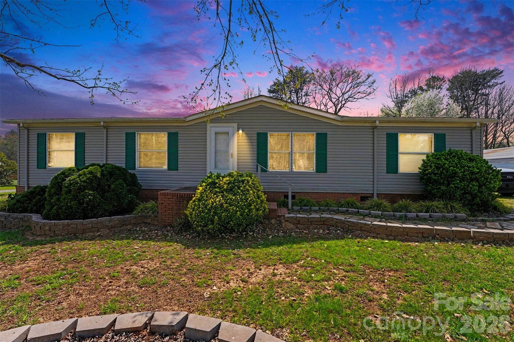 940 John Miller Road Rockwell, NC 28138 - Photo 1 of 28 a front view of a house with garden