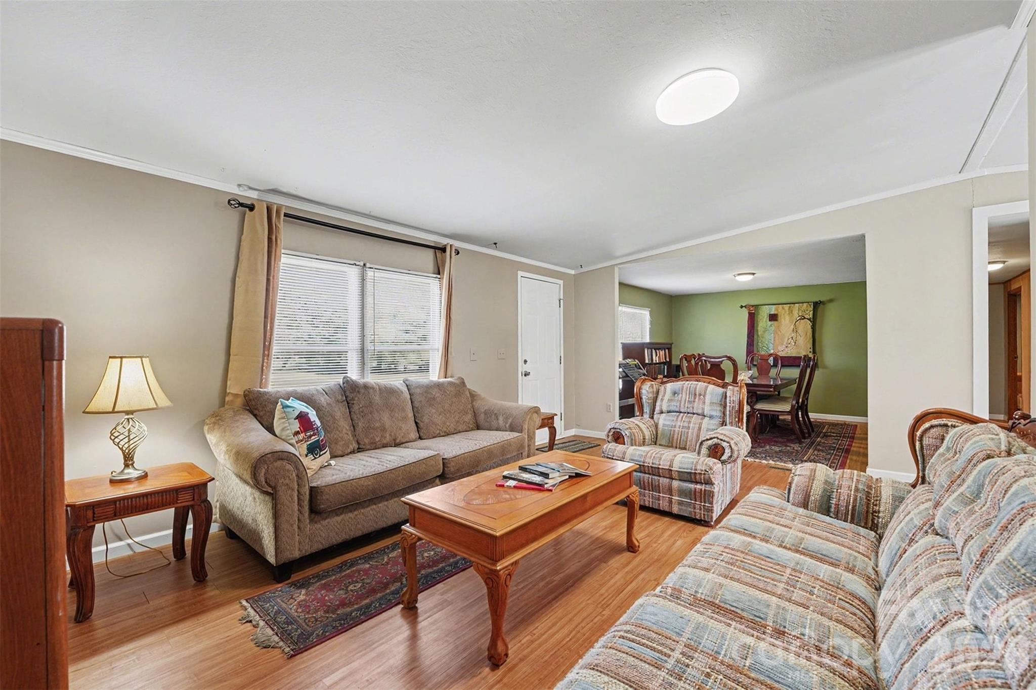 940 John Miller Road Rockwell, NC 28138 - Photo 11 of 28 a living room with furniture and a large window