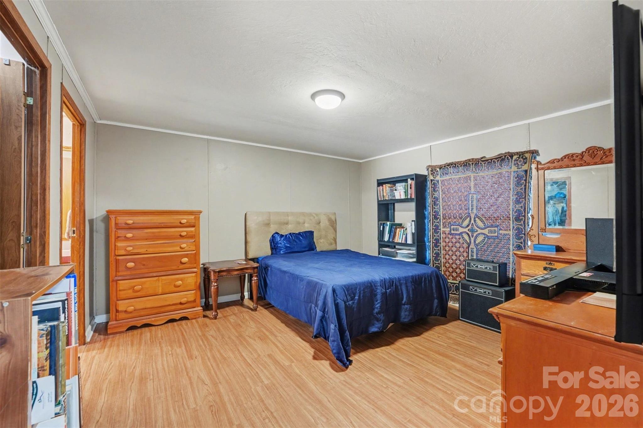 940 John Miller Road Rockwell, NC 28138 - Photo 13 of 28 a bedroom with a bed and furniture