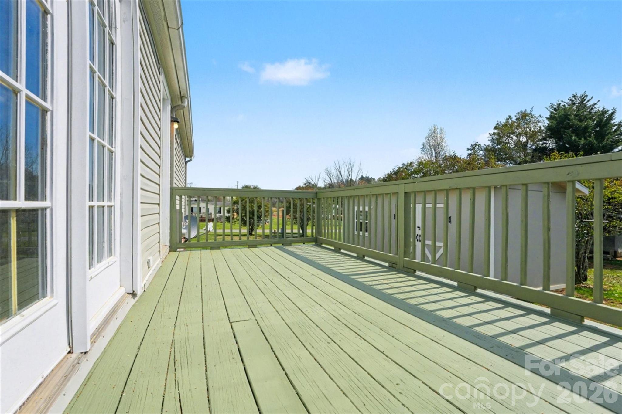 940 John Miller Road Rockwell, NC 28138 - Photo 22 of 28 a view of balcony with wooden floor and fence