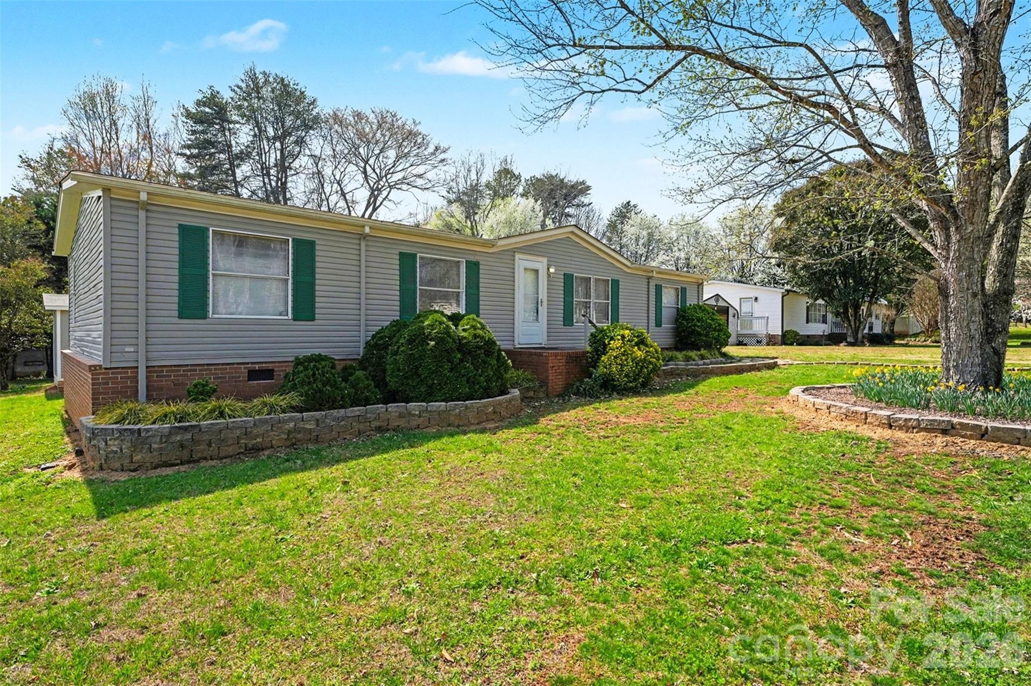 940 John Miller Road Rockwell, NC 28138 - Photo 4 of 28 a view of a yard in front of house