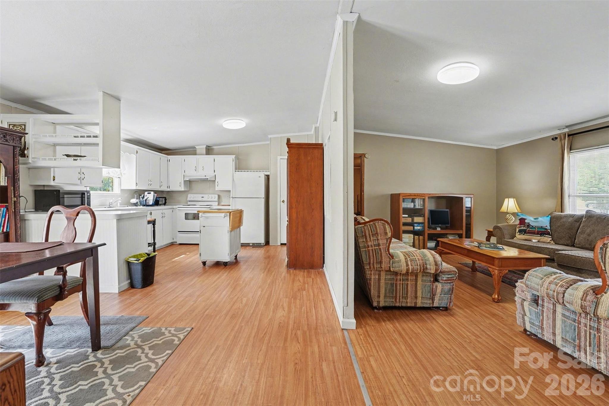 940 John Miller Road Rockwell, NC 28138 - Photo 7 of 28 a living room with furniture and a wooden floor