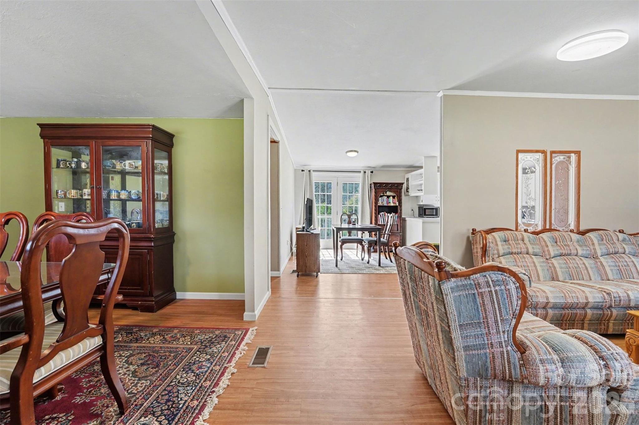 940 John Miller Road Rockwell, NC 28138 - Photo 9 of 28 a living room with furniture and wooden floor