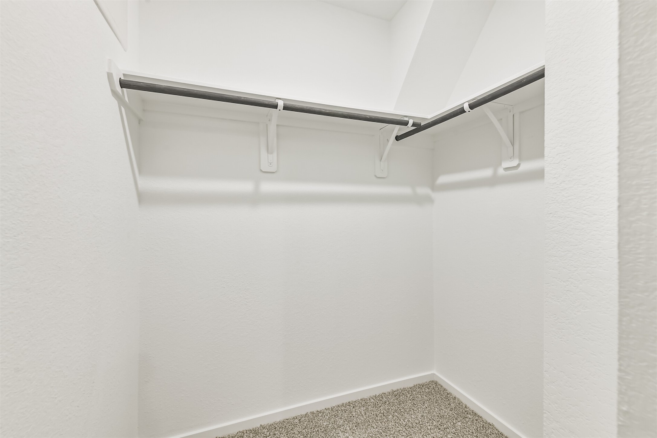 819 Sweet Jubilee Lane Houston, TX 77090 - Photo 14 of 25 a view of an empty walk in closet