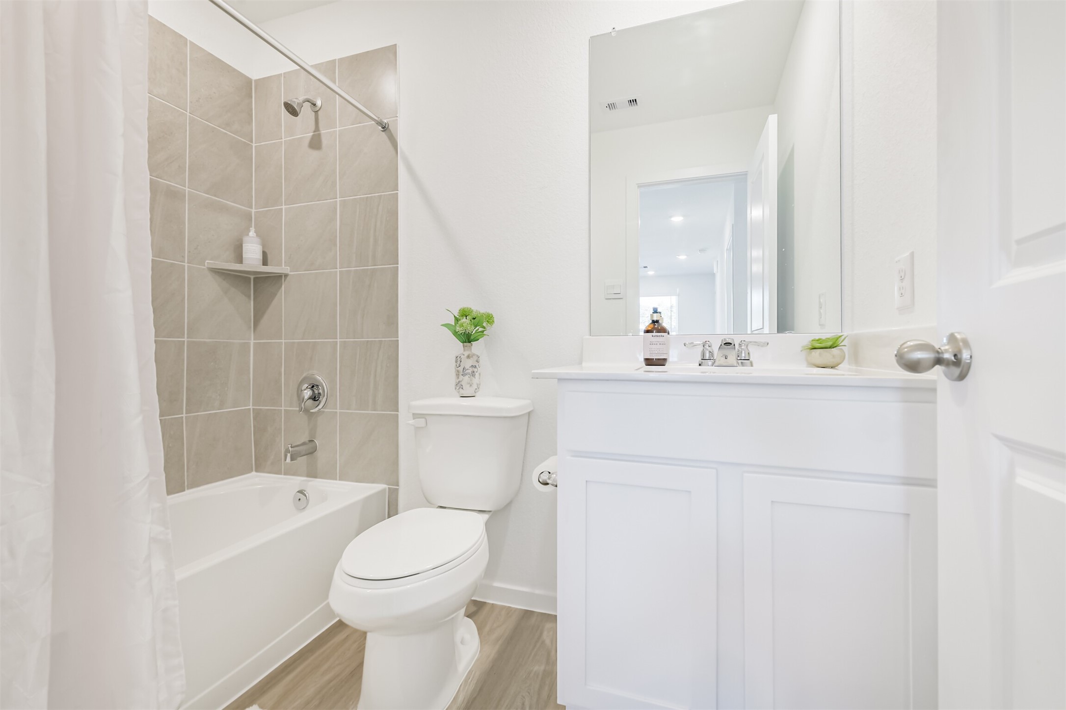 819 Sweet Jubilee Lane Houston, TX 77090 - Photo 17 of 25 a bathroom with a sink toilet and shower