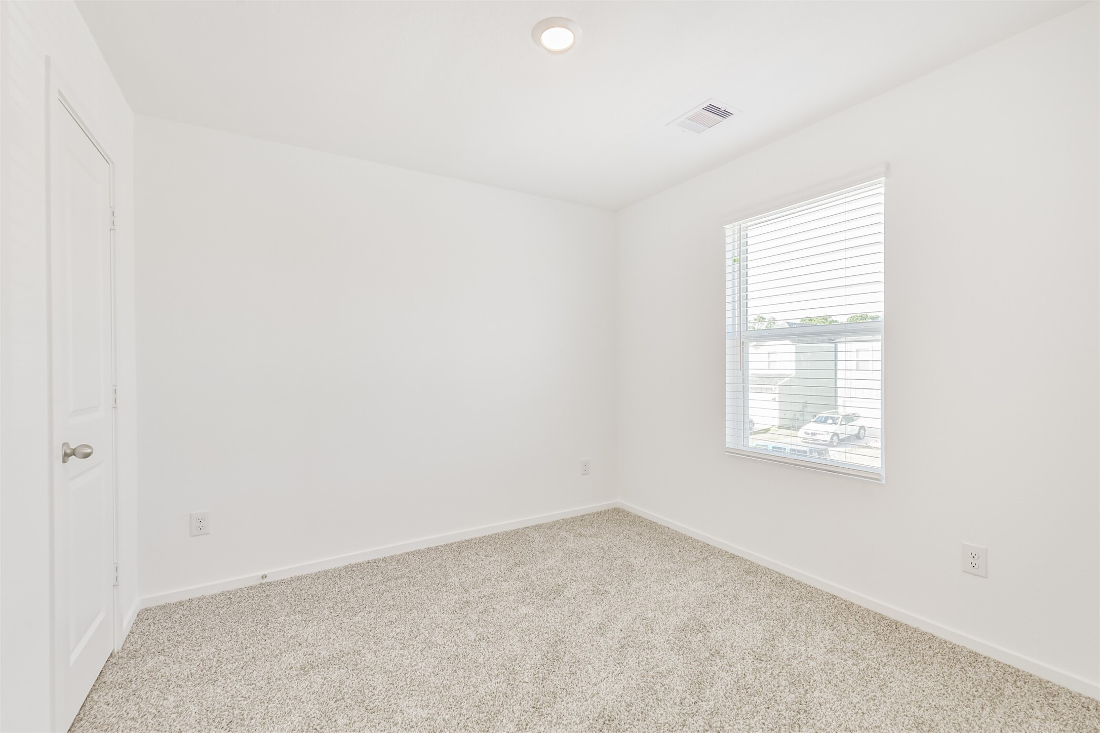 819 Sweet Jubilee Lane Houston, TX 77090 - Photo 18 of 25 an empty room with a window