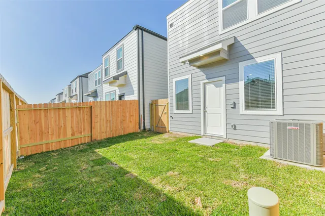 a view of a back yard of the house