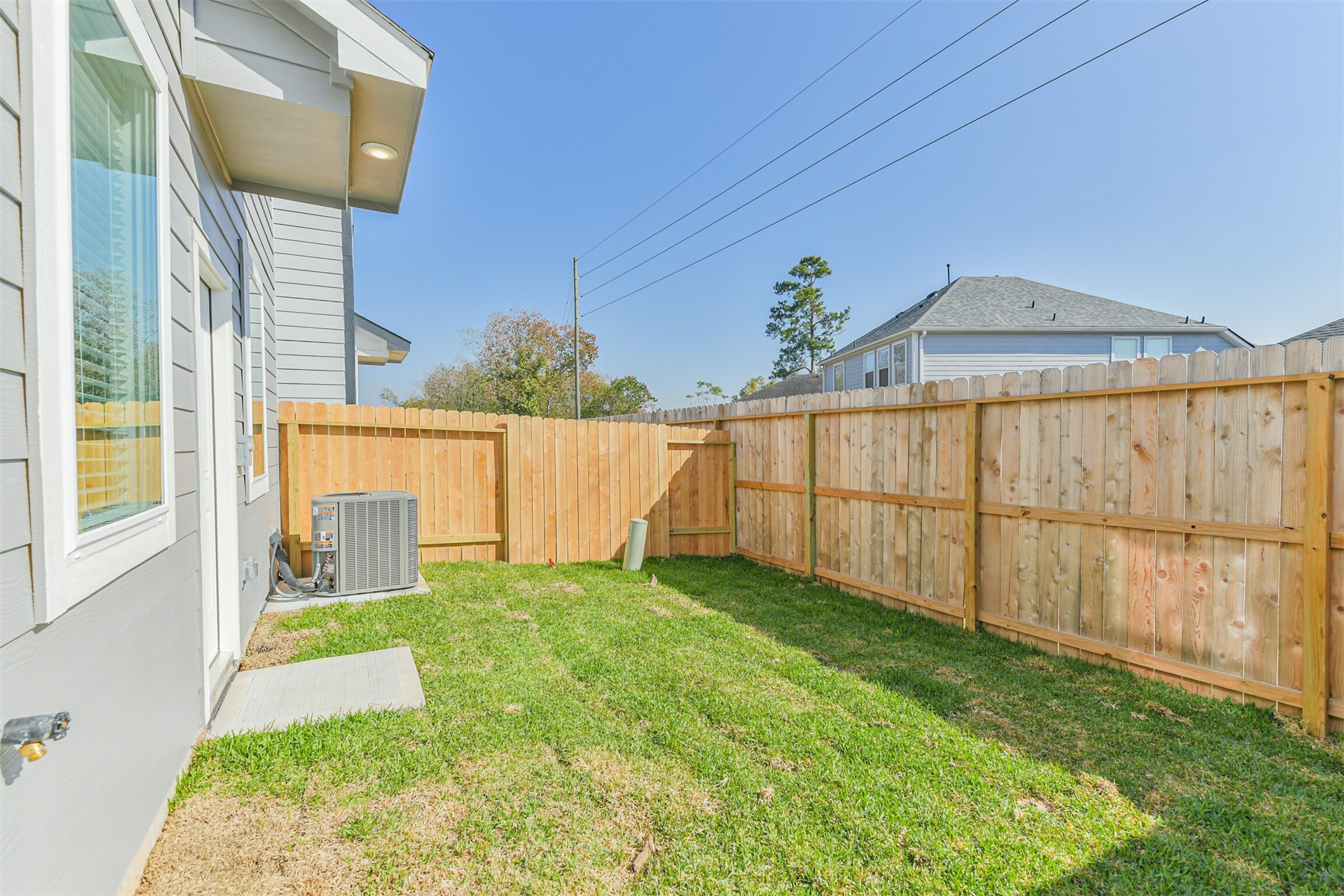 819 Sweet Jubilee Lane Houston, TX 77090 - Photo 23 of 25 a view of a backyard
