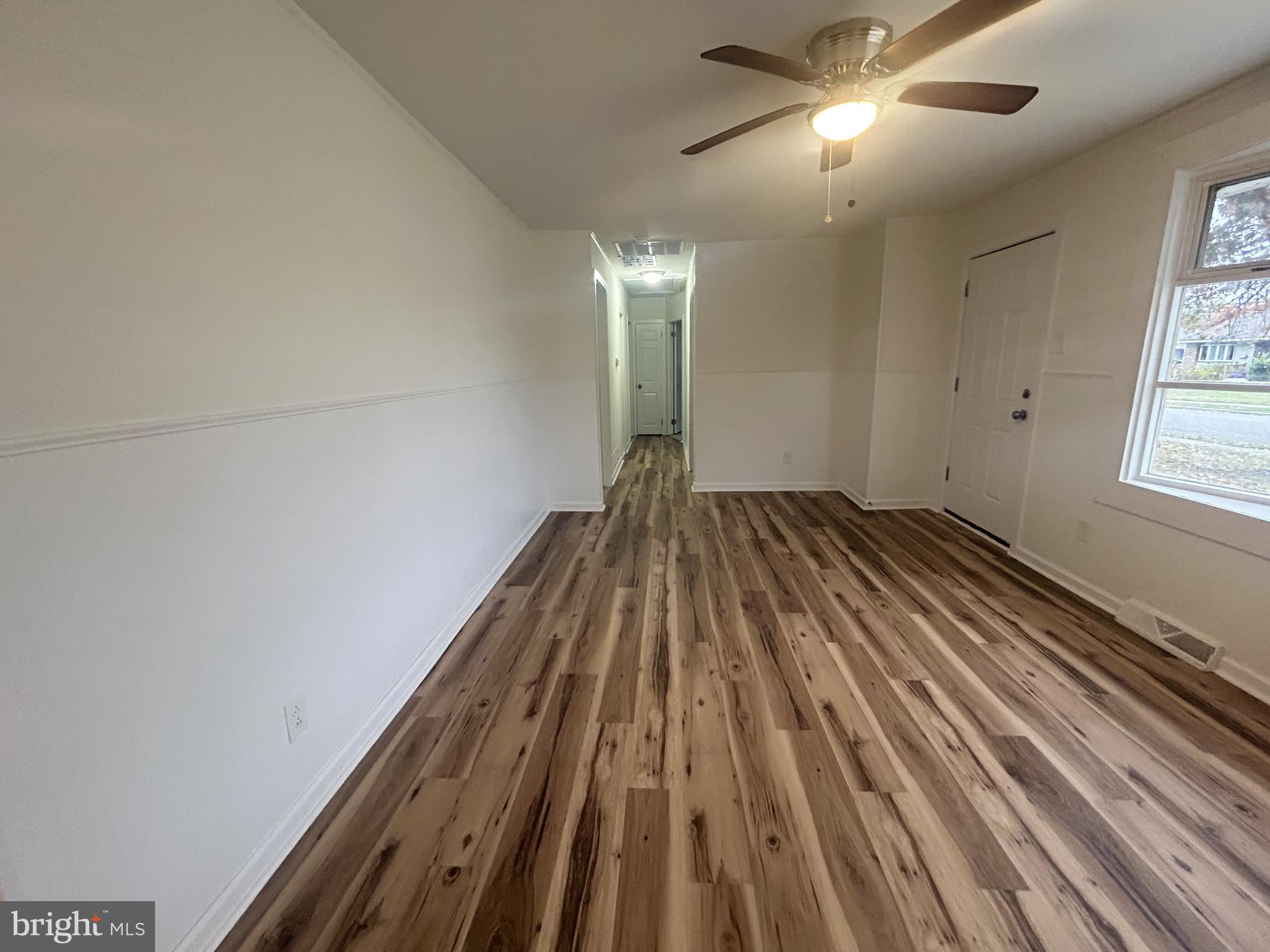 15 Livingstone Road Sewell, NJ 08080 - Photo 4 of 16 a view of wooden floor in an empty room