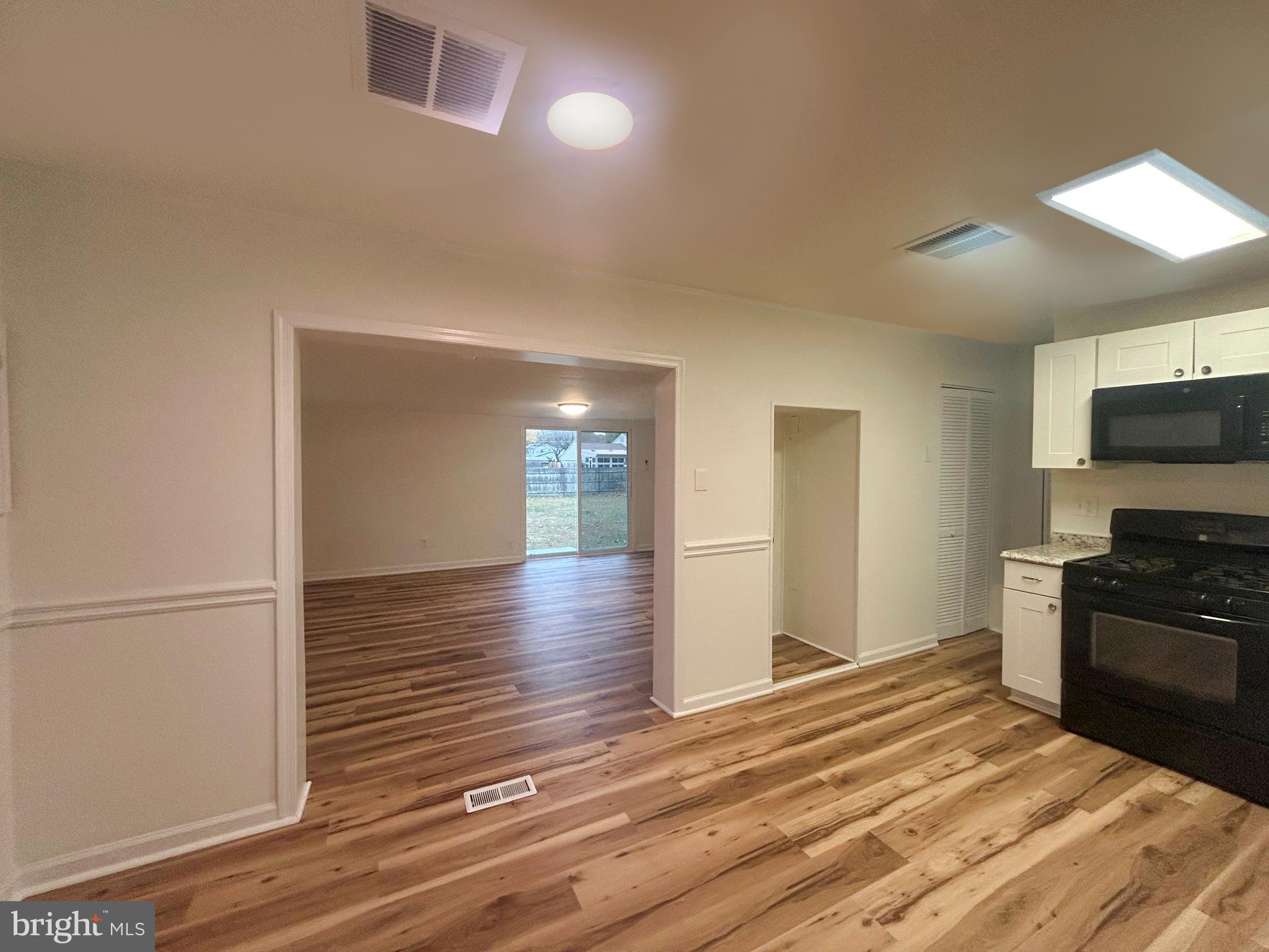15 Livingstone Road Sewell, NJ 08080 - Photo 6 of 16 a view of a livingroom with wooden floor