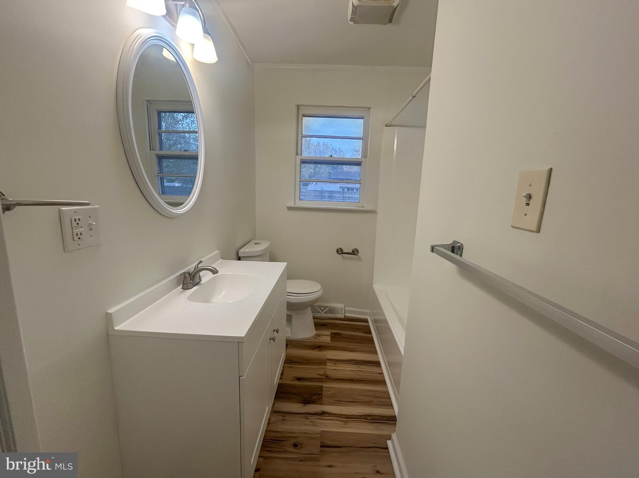 15 Livingstone Road Sewell, NJ 08080 - Photo 7 of 16 a bathroom with a sink and a mirror