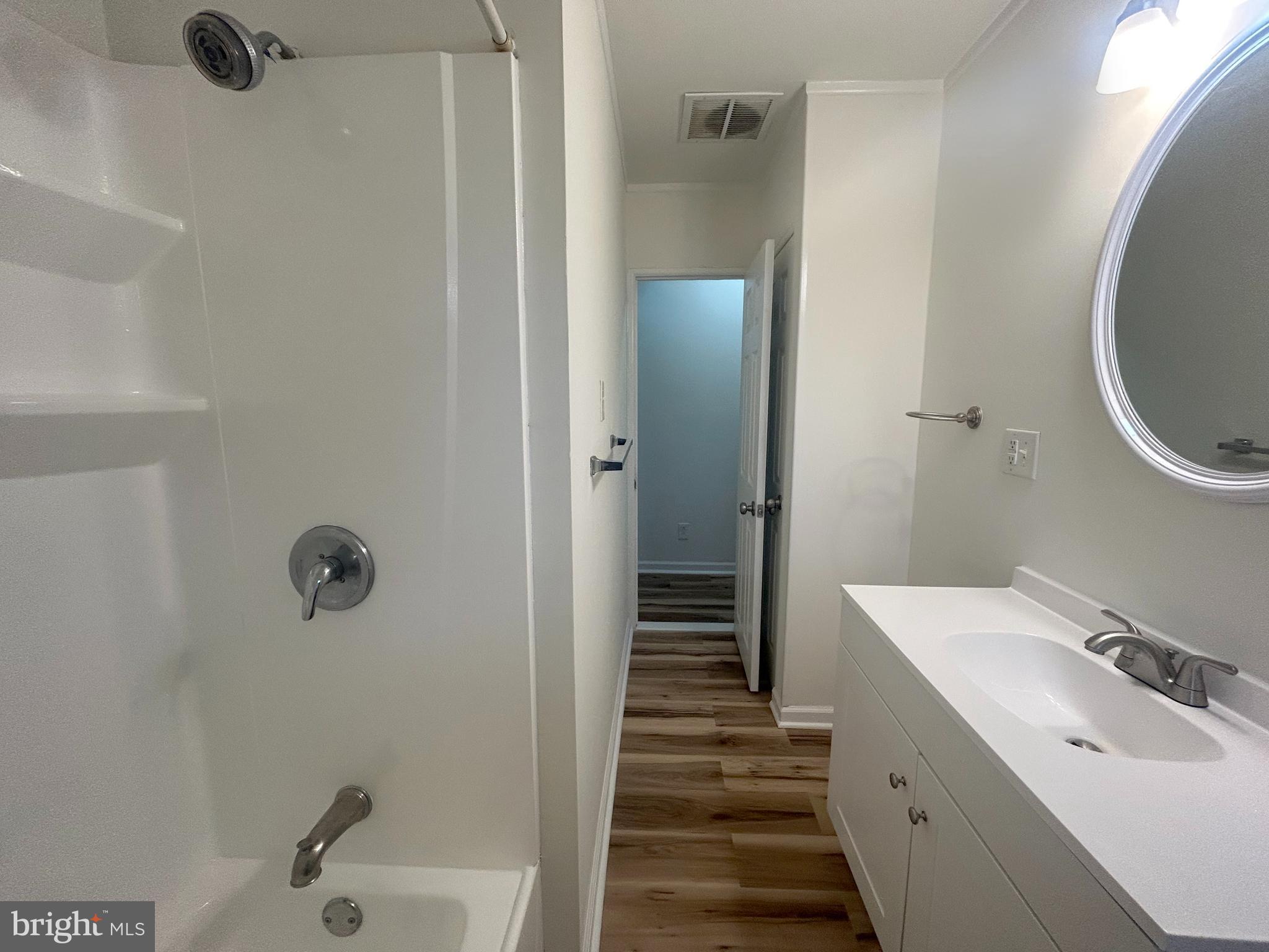 15 Livingstone Road Sewell, NJ 08080 - Photo 8 of 16 a bathroom with a sink and mirror with toilet